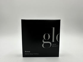 Glo Skin Beauty Bronze cheekbone-temple-jawline warmth near defined contours.