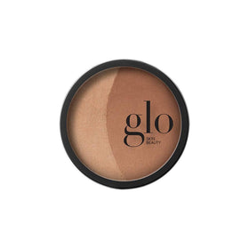 Glo Skin Beauty Bronze natural mineral pressed bronzer on the face for sun-kissed warmth.