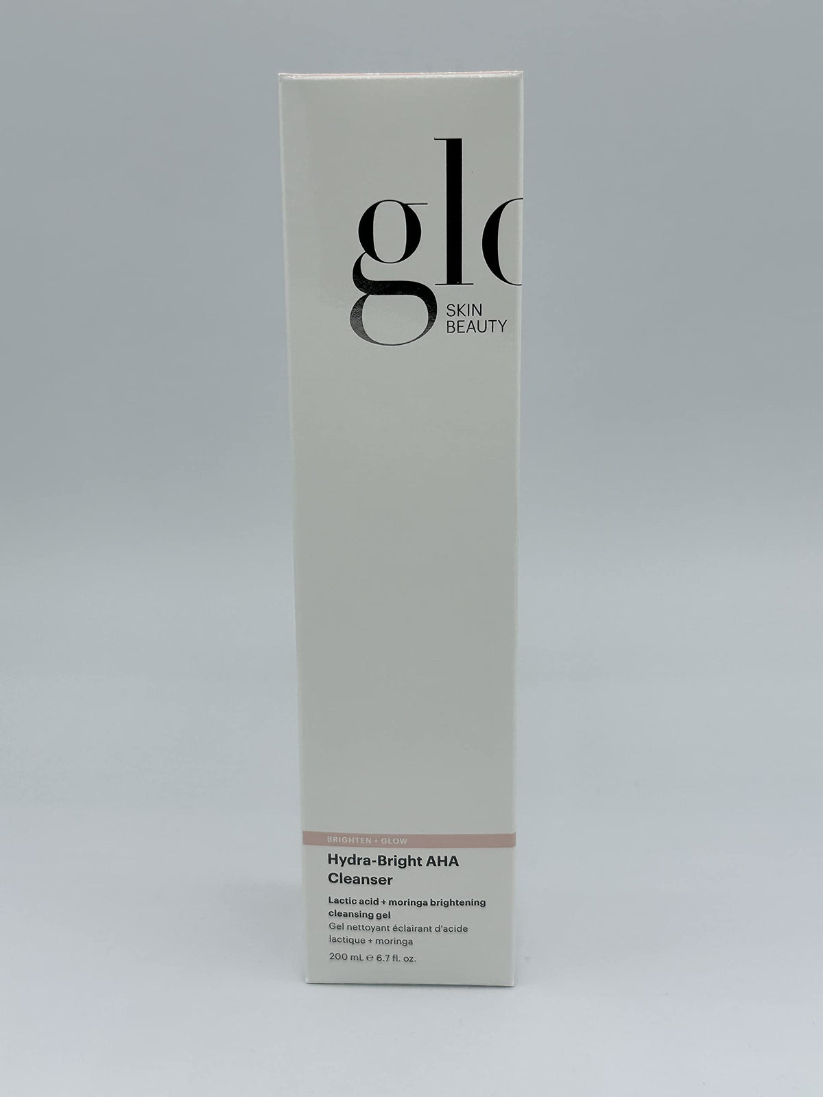 Glo Skin Beauty Hydra-Bright AHA Cleanser helps refine pores and texture on skin.