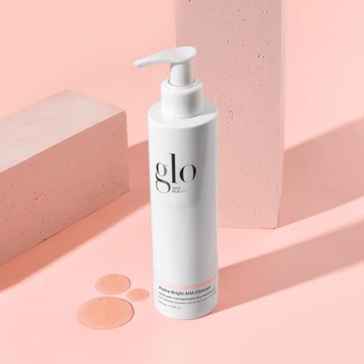 Glo Skin Beauty Hydra-Bright AHA Cleanser highlights moringa seed extract for radiant, balanced skin.