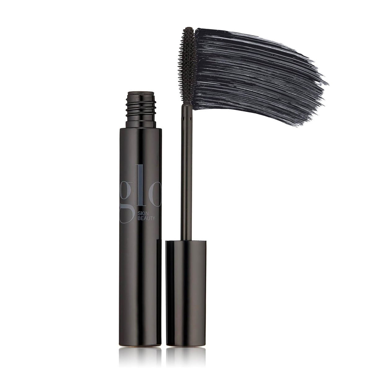 Glo Skin Beauty Lash Lengthening Mascara bottle closeup shows rich pigment for definition.