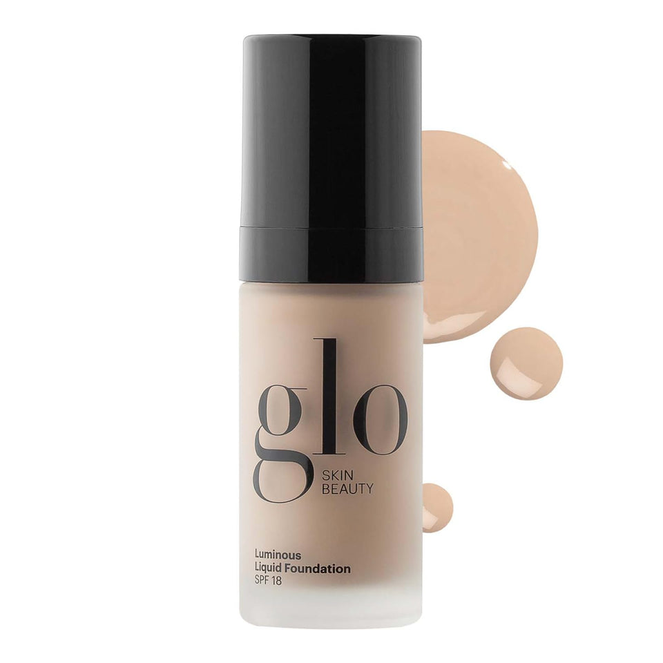 Glo Skin Beauty Luminous Liquid Foundation Naturelle bottle close-up showing radiant, even glow.