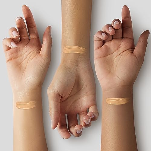 Glo Skin Beauty Luminous Liquid Foundation Naturelle bottle on the skin shows dewy finish.