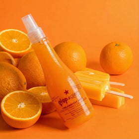 Glop and Glam Creamsicle Mist with neem and aloe ingredients.