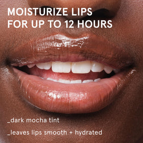 Glossier Balm Dotcom Mocha Tint lip balm with a warm, natural tint.