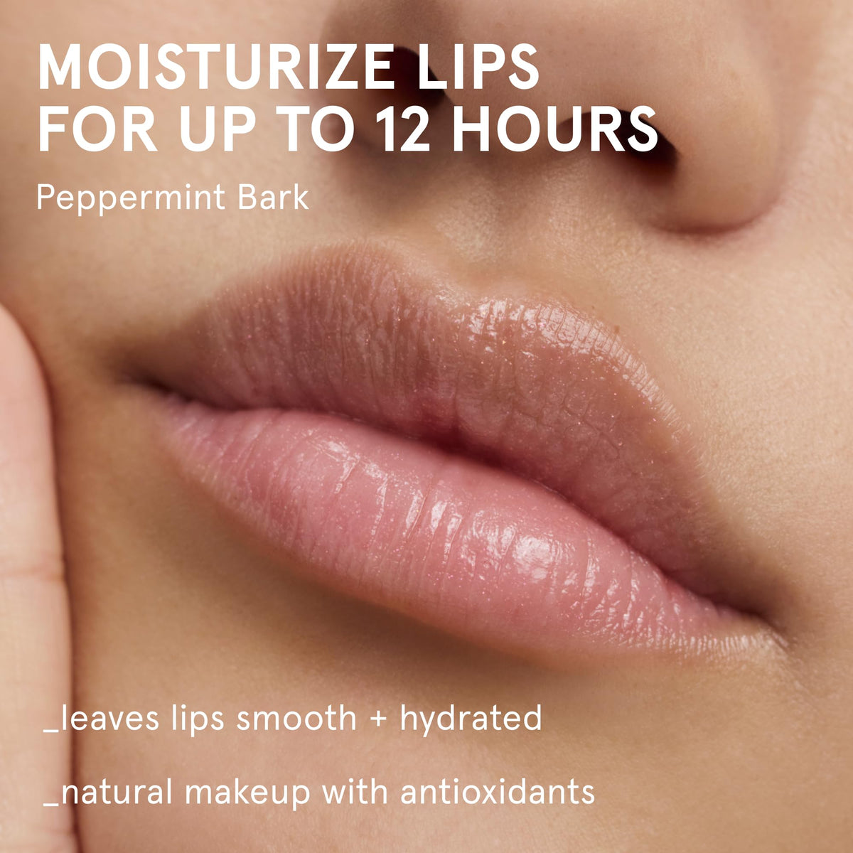 Close-up of Balm Dotcom texture; rich, non-greasy glide for dry lips.