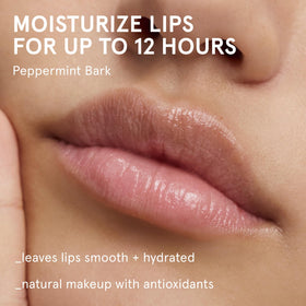 Close-up of Balm Dotcom texture; rich, non-greasy glide for dry lips.