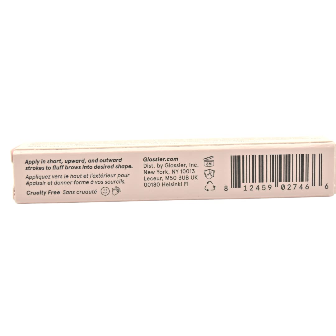 Glossier Boy Brow clear gel on brow hairs for a natural, fuller look.
