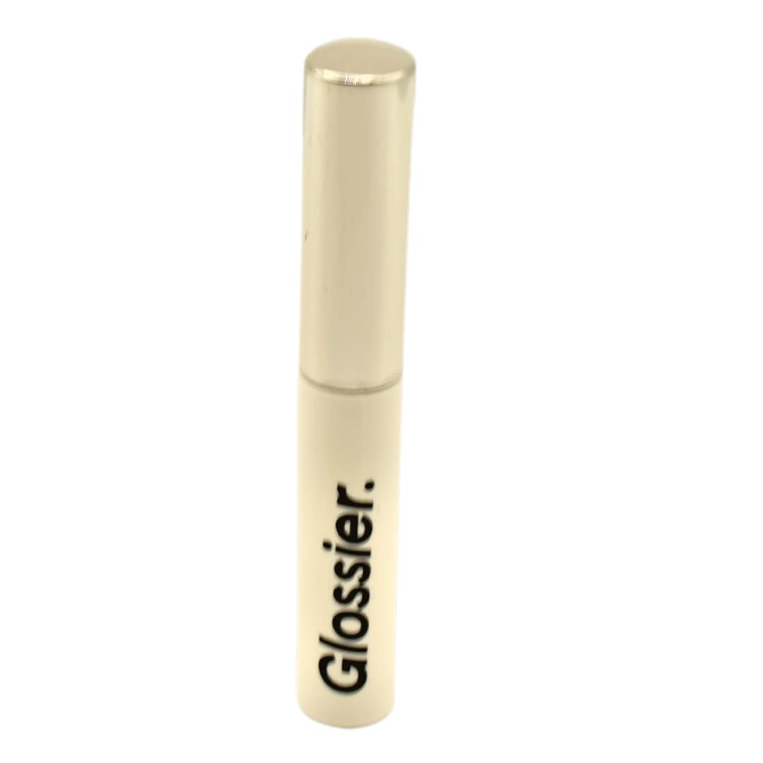 Glossier Boy Brow precision brush close-up illustrates even coat for fuller, natural brows.