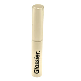 Glossier Boy Brow precision brush close-up illustrates even coat for fuller, natural brows.