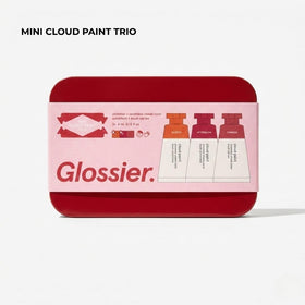 Glossier Cloud Paint Glisten swatch with warm terracotta and gold shimmer
