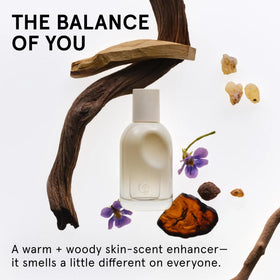 Glossier You Doux bottle side view highlighting the elegant silhouette