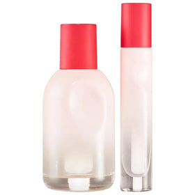 Glossier You holiday set bottle close-up emphasizes gift-ready aesthetic
