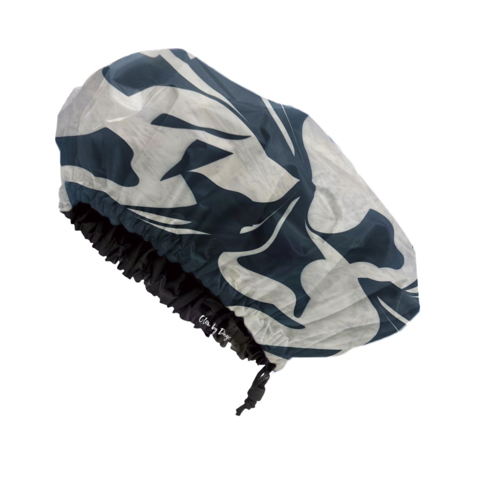 Glow By Daye shower cap with satin interior protects hair while showering