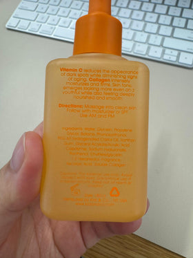 Soft glow image of Glow Elixir bottle signaling healthy-looking skin