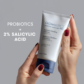 Glowbiotics Probiotic Clarifying Cleanser foam pump for makeup removal with gentle foam.