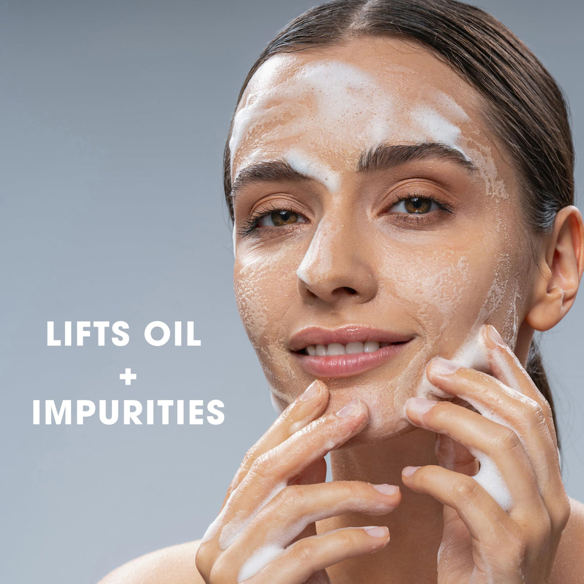 Glowbiotics Probiotic Clarifying Cleanser texture closeup showing light, soothing foam.