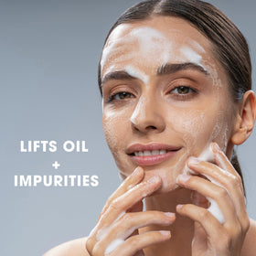 Glowbiotics Probiotic Clarifying Cleanser texture closeup showing light, soothing foam.