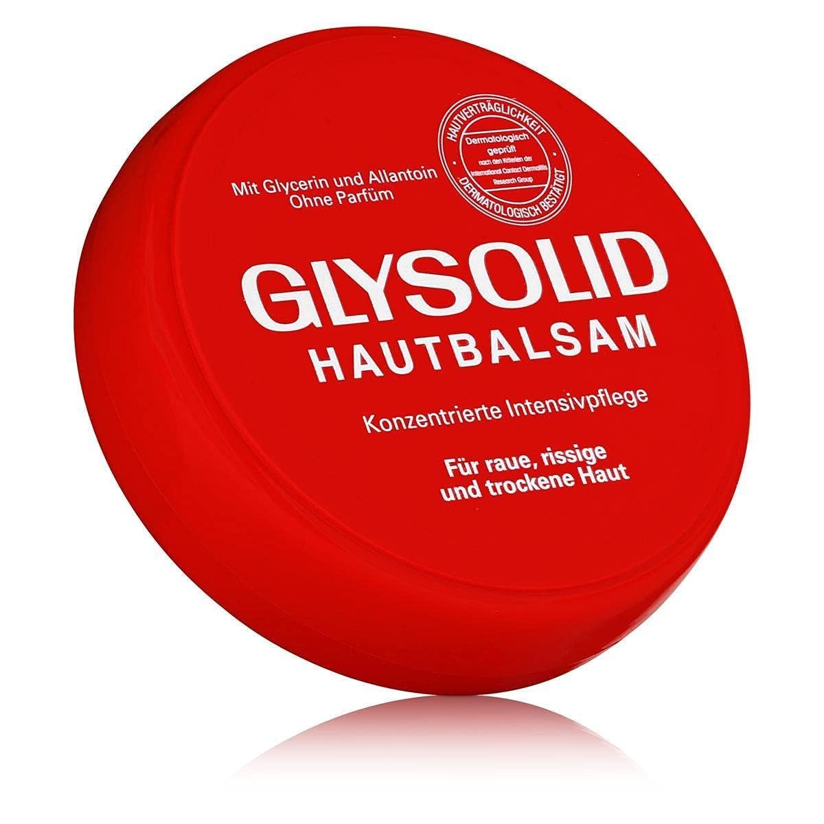 Glysolid glycerin cream being applied to hands for soft, moisturized skin.