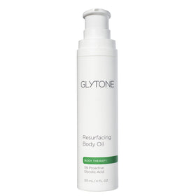 Glytone Resurfacing Body Oil bottle pour showing gentle exfoliation