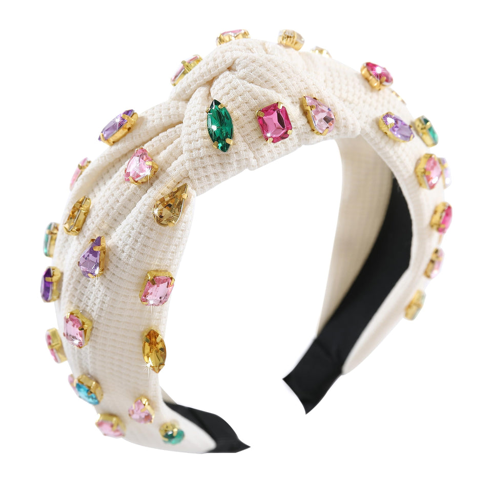 Gmmidea jeweled knotted headband with sparkling rhinestones for party-ready shine.