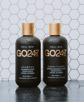 GO247 Daily Shampoo packaging on shelf, modern travel-friendly design