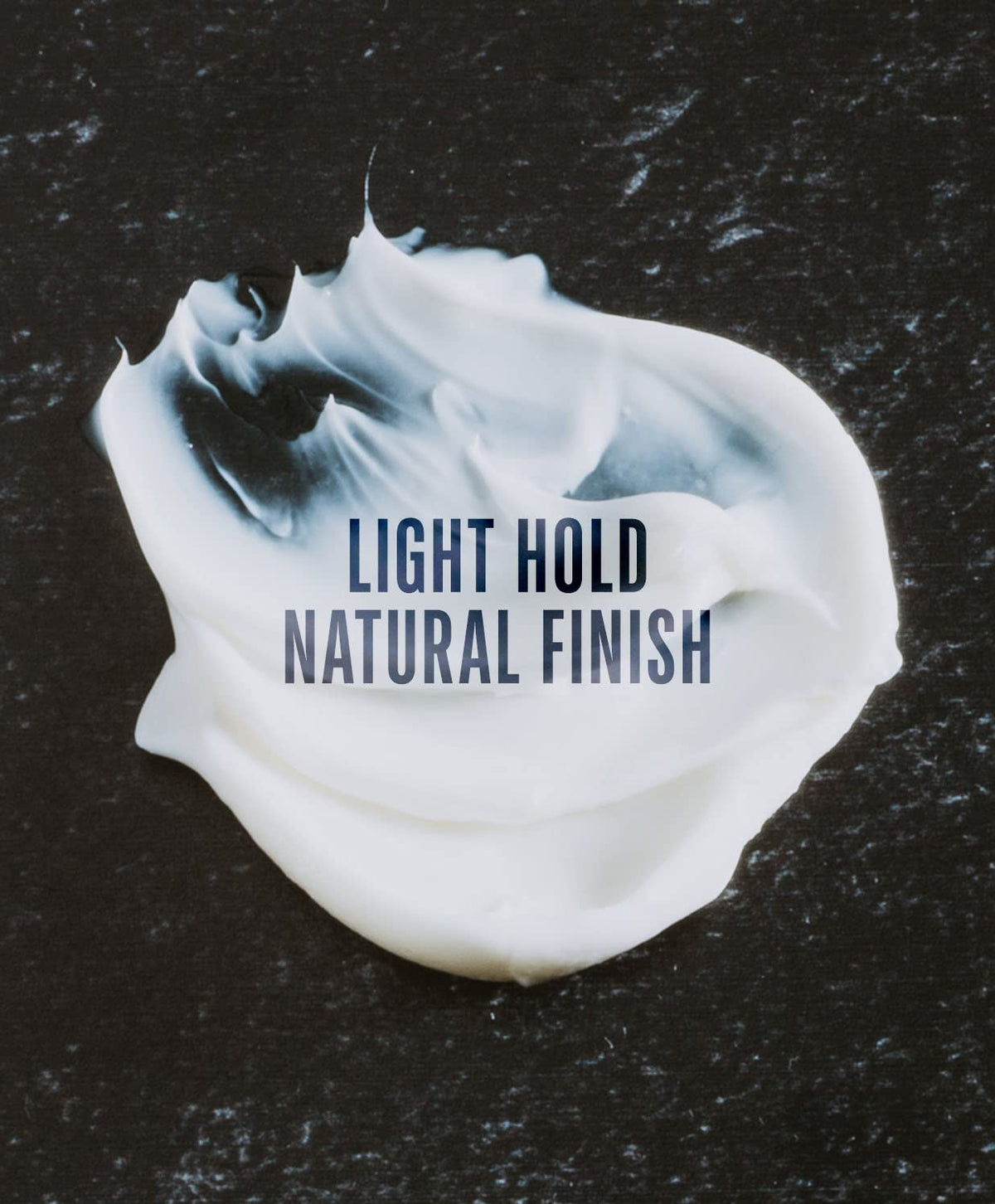 GO247 Grooming Cream applied to wet hair for light hold and added texture.