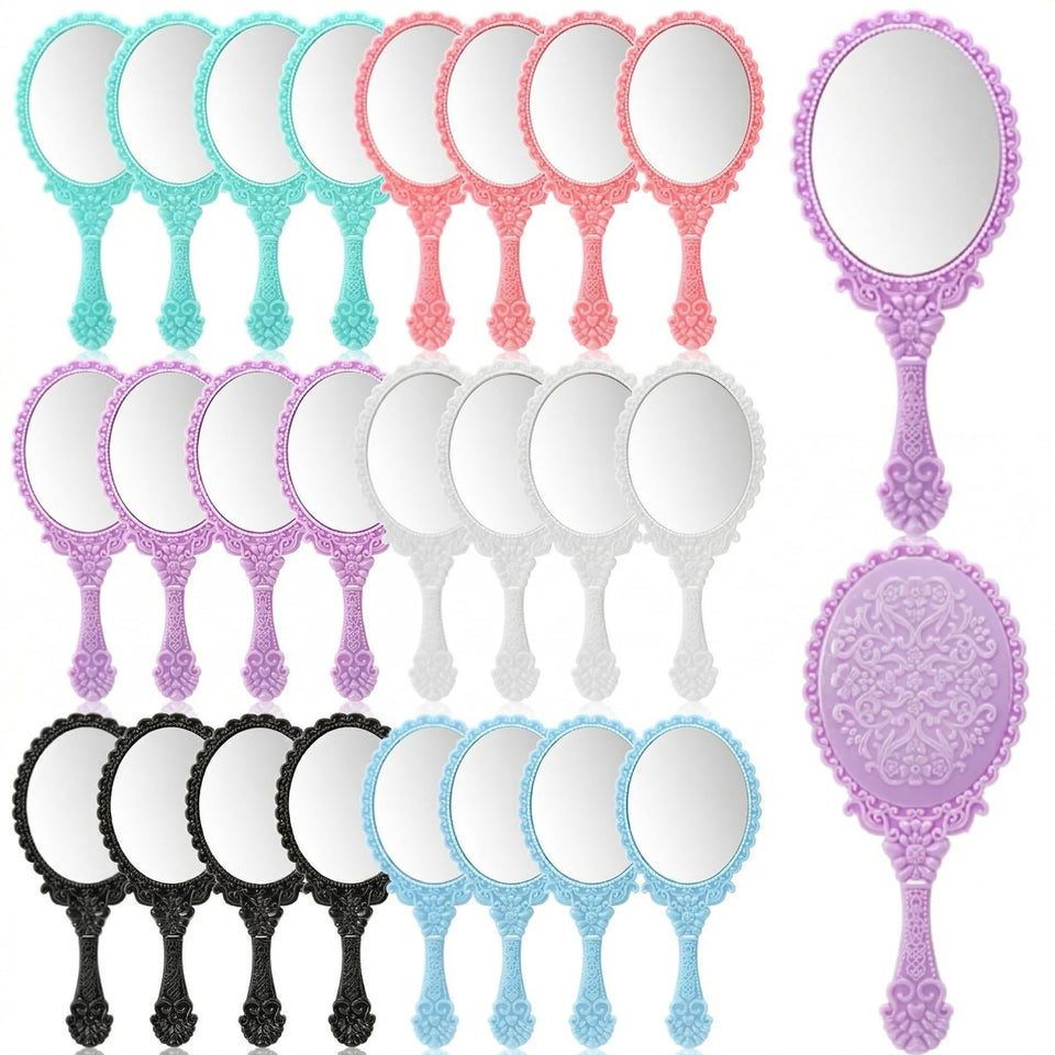 Goaste vintage handheld mirror with embossed flower design for makeup checks.