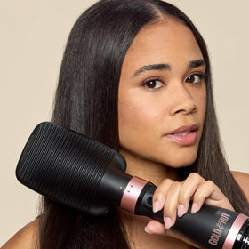 Gold N Hot Ionic Dryer paddle brush detangles and smooths textured hair.