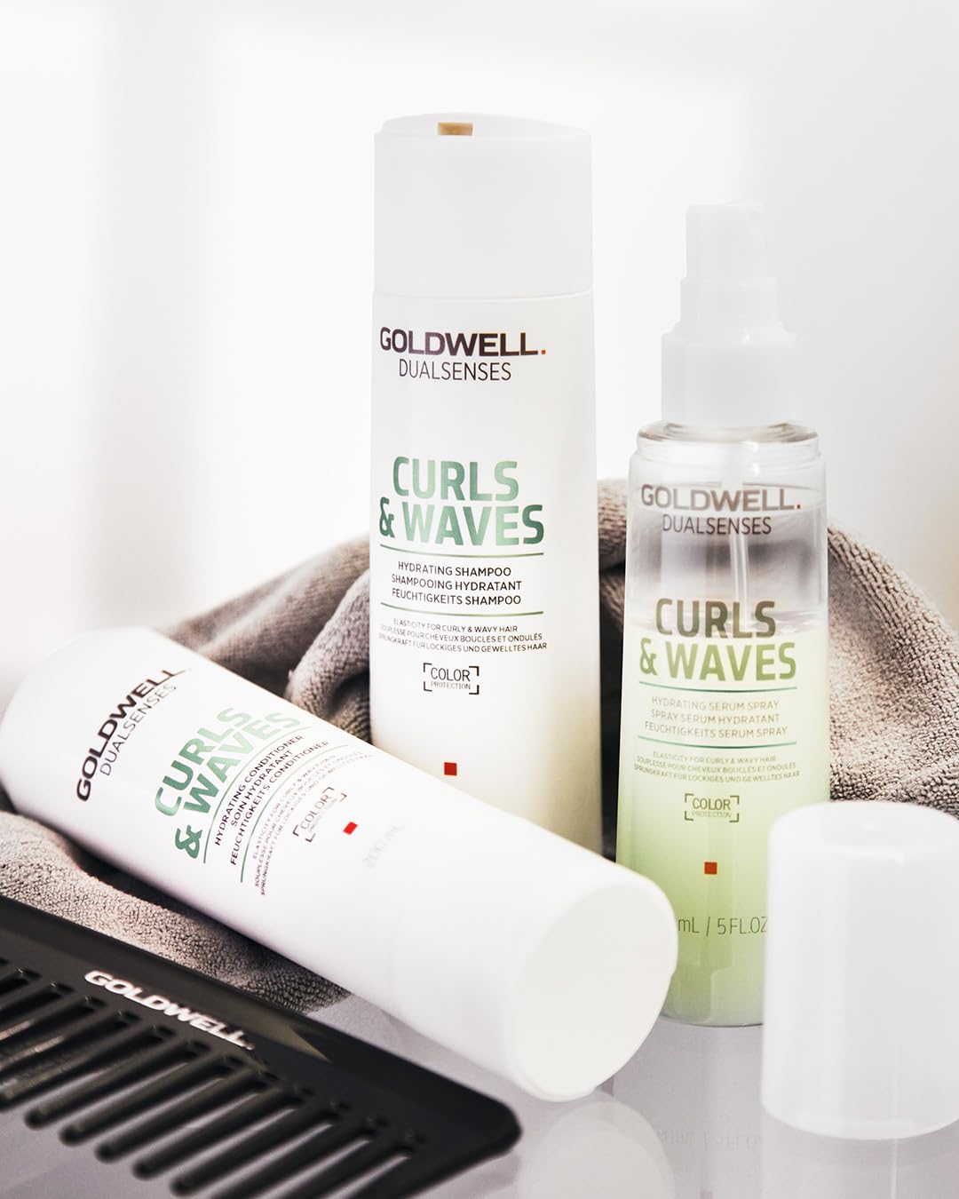 Goldwell Dualsenses packaging on bathroom shelf for curly hair care