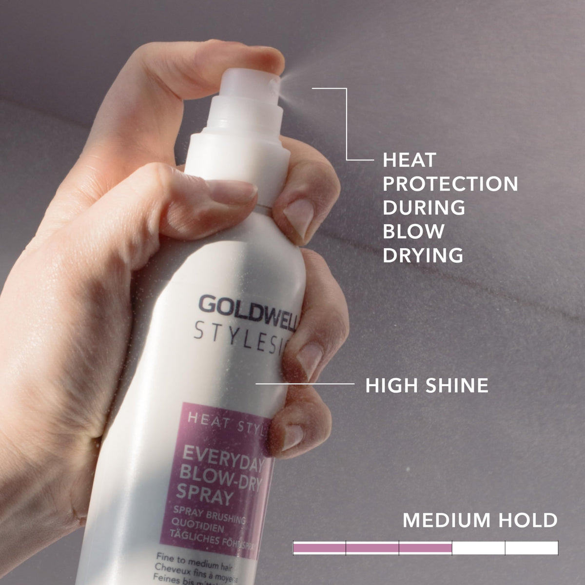 Goldwell StyleSign Everyday Blow-Dry Spray adds natural shine for a polished finish.