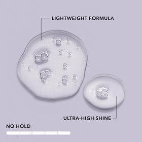 Dispensing pump of Goldwell Weightless Shine-Oil ready for towel-dried hair