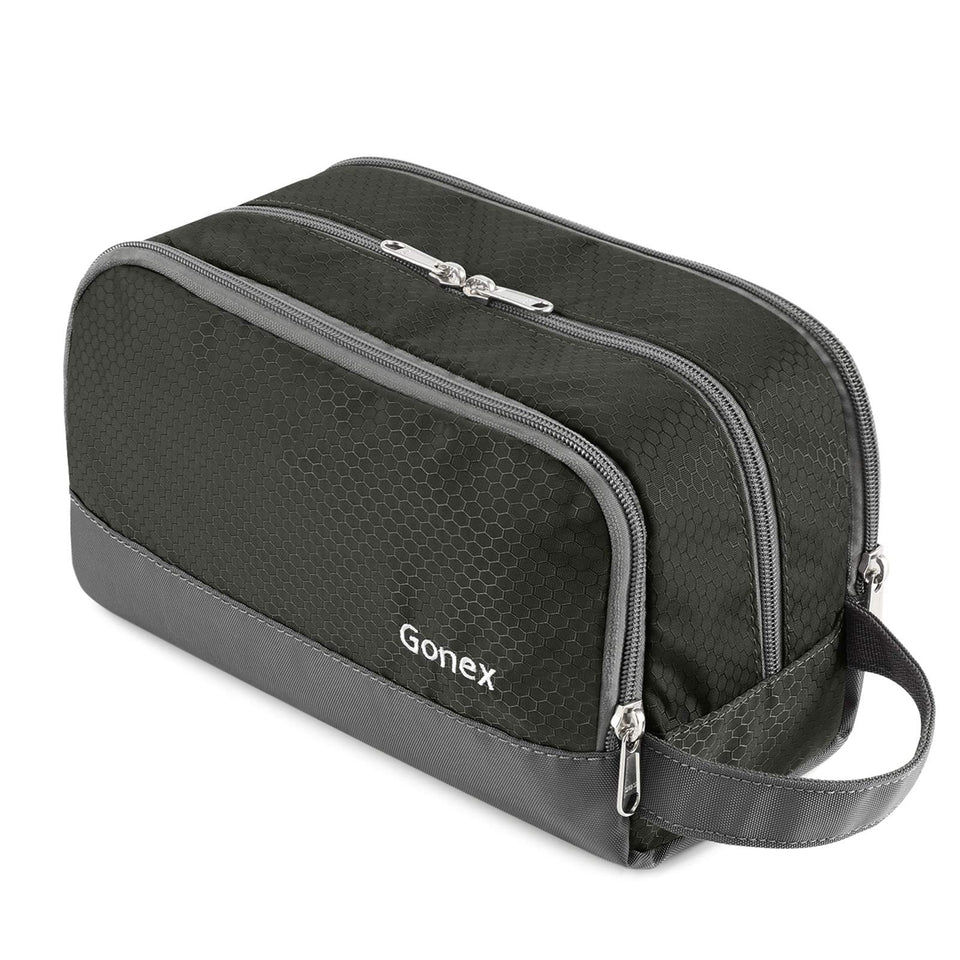 Gonex travel toiletry bag in gray showing the main compartment for large bottles.