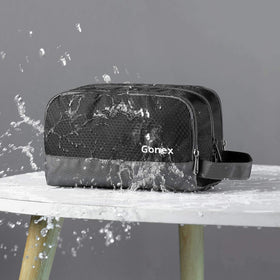 Gonex Travel Toiletry Bag opened to reveal the main compartment for bottles.
