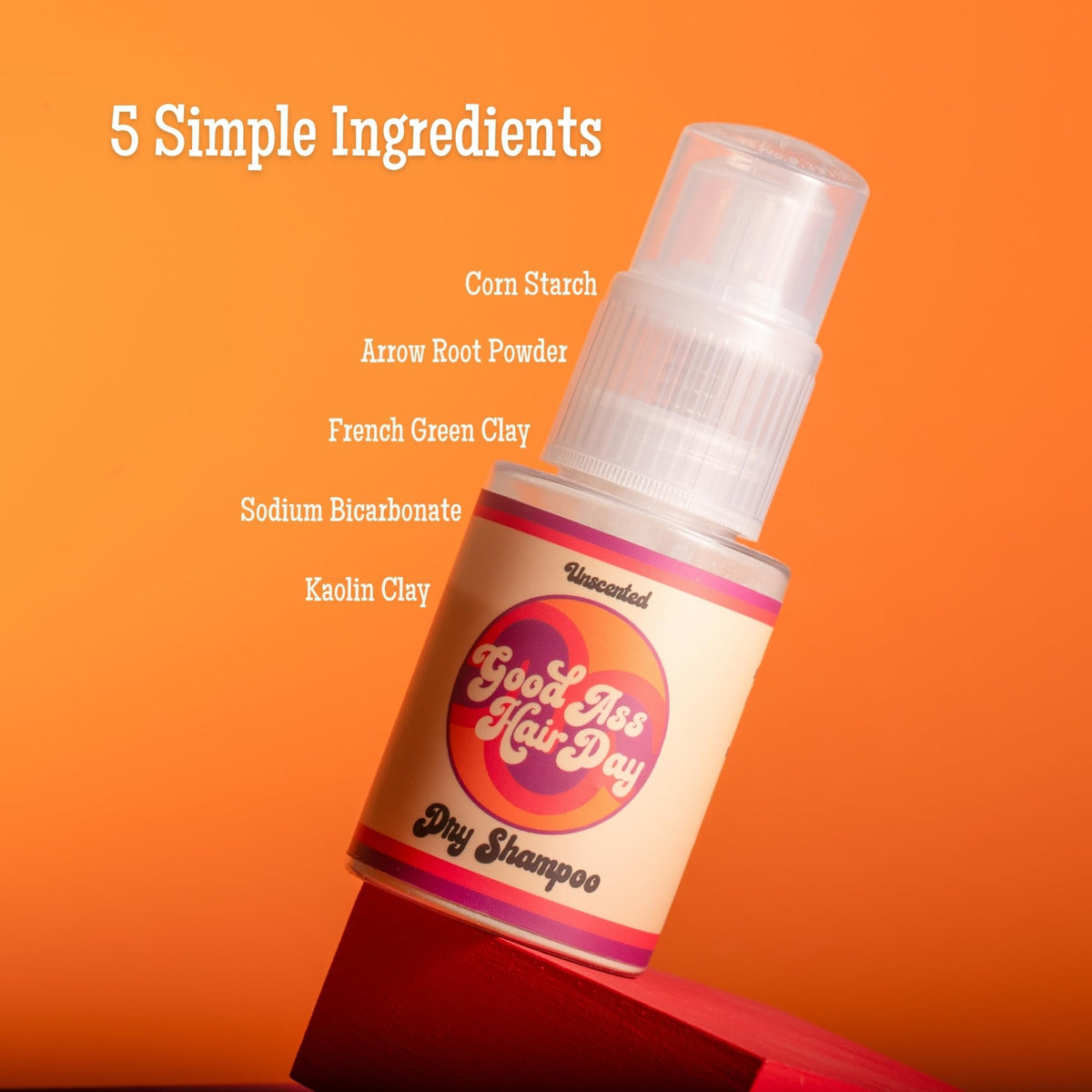 Good Ass Hair Day dry shampoo powder features natural ingredients for a clean refresh.