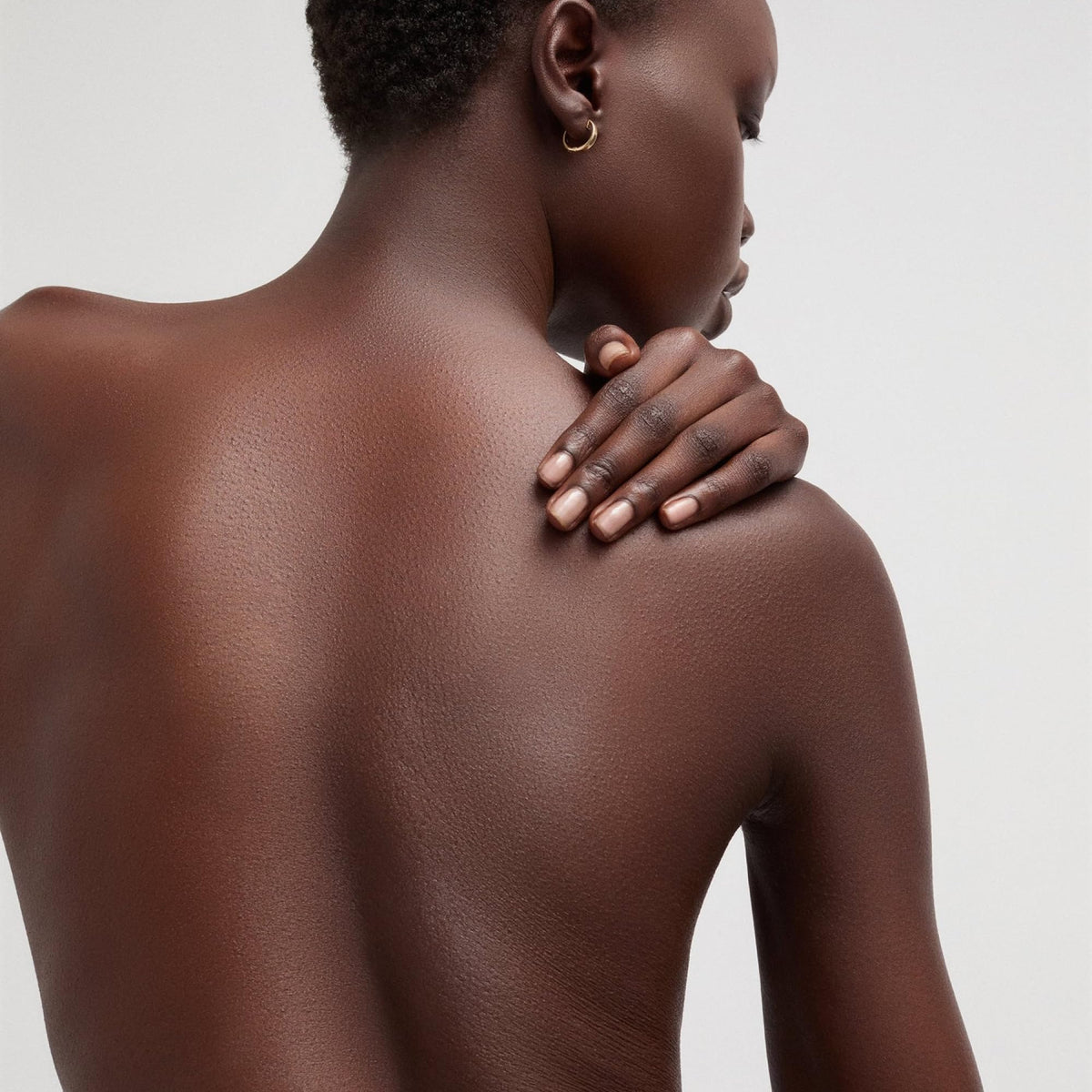 Goop Beauty Body Butter applied on skin, demonstrating visible hydration