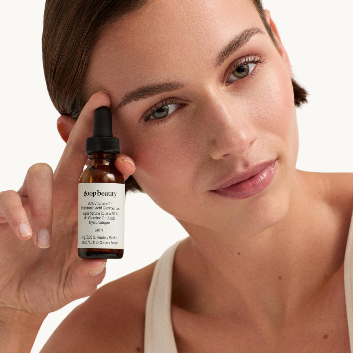 Goop Beauty hyaluronic acid serum dropper ready for mixing to boost hydration.