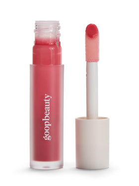 Goop Hydra-Barrier Gel Gloss tube showcasing hydrating lip care in sleek packaging.