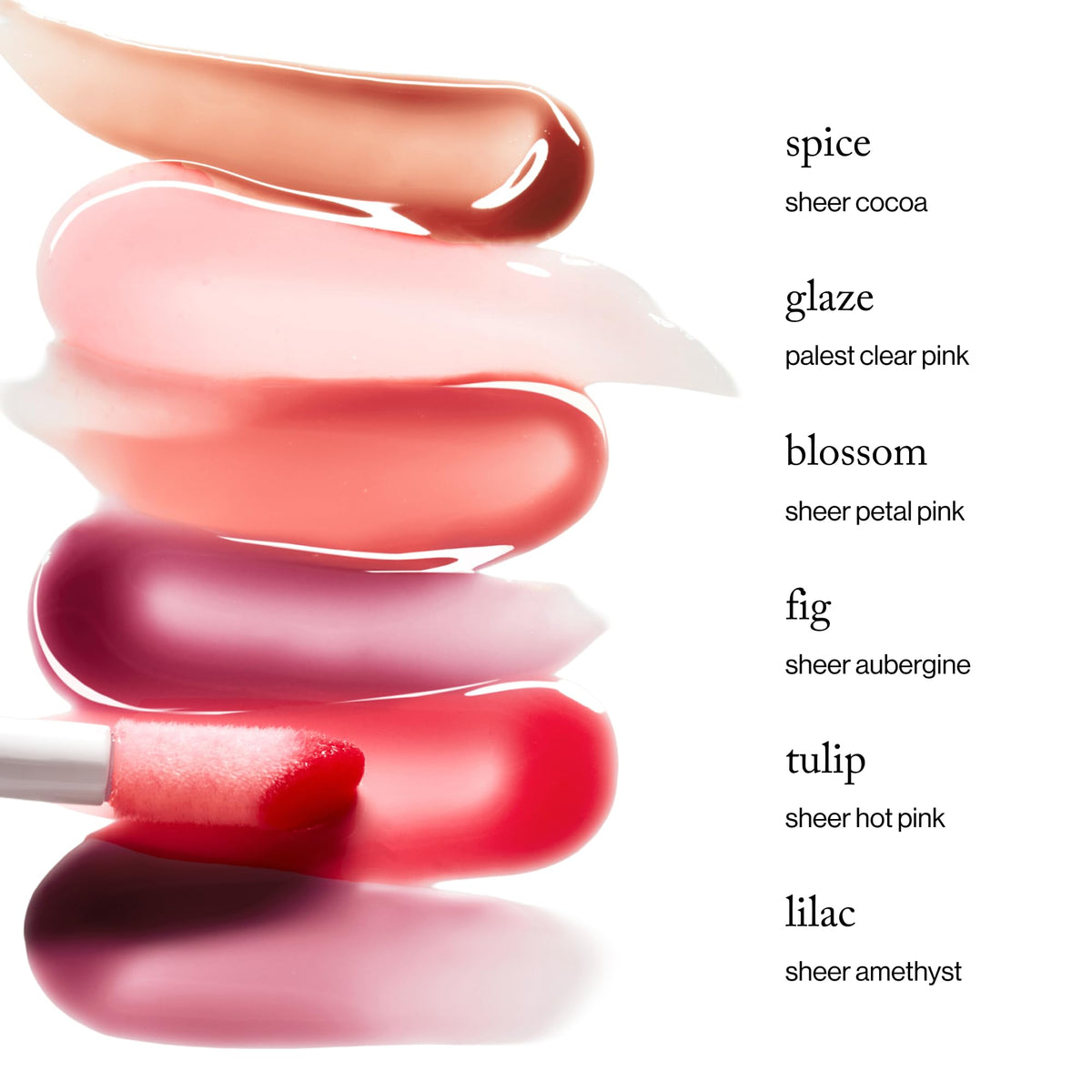 Goop Hydra-Barrier Gloss Spice swatch highlights warm shade with lasting shine.