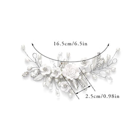 GORAIS leaves and crystals on hair vine catch light with refined shine