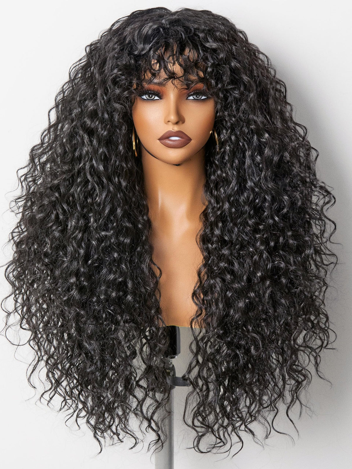 GORGIUS Veralux blend shaggy wig with bangs offers natural movement and lasting style.