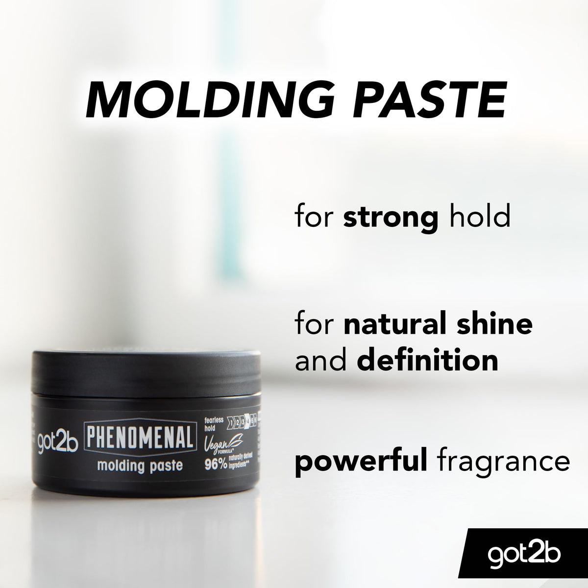 Applying Got2B Phenomenal Moulding Paste for a classic groomed look
