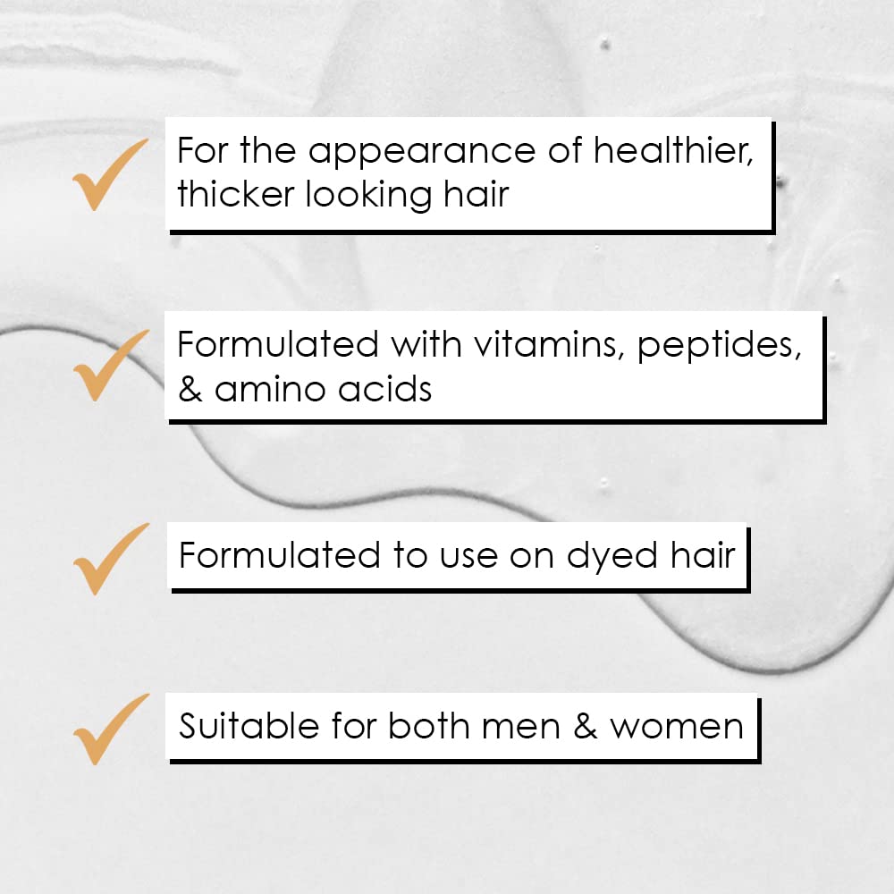 GrandeHAIR serum dropper delivering controlled dosage for targeted scalp application.