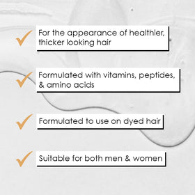 GrandeHAIR serum dropper delivering controlled dosage for targeted scalp application.