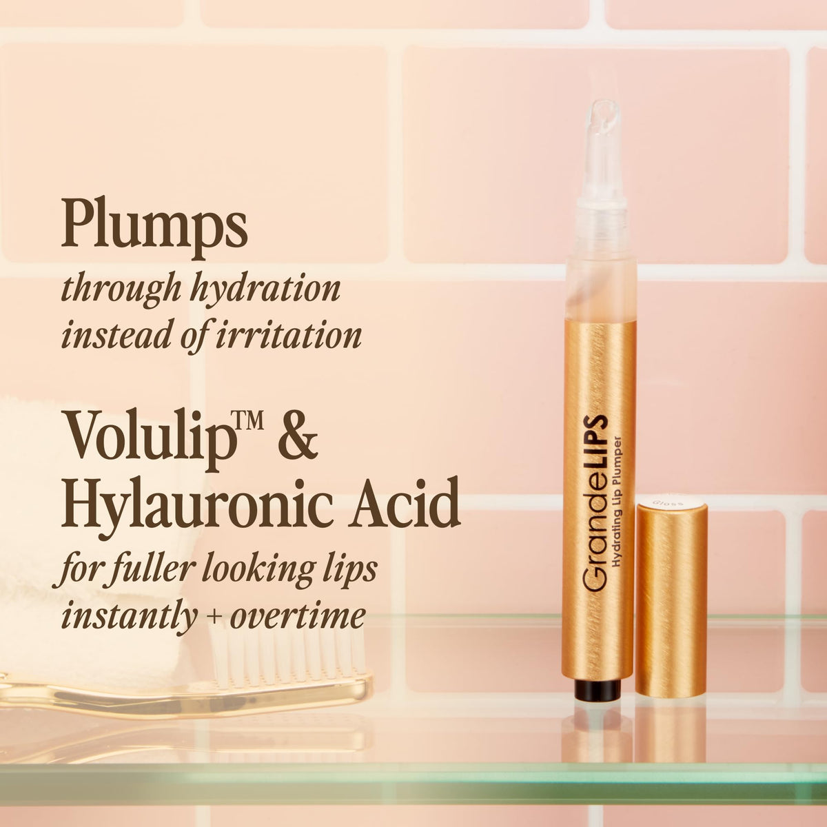 Close-up of lip plumper applicator ready for use