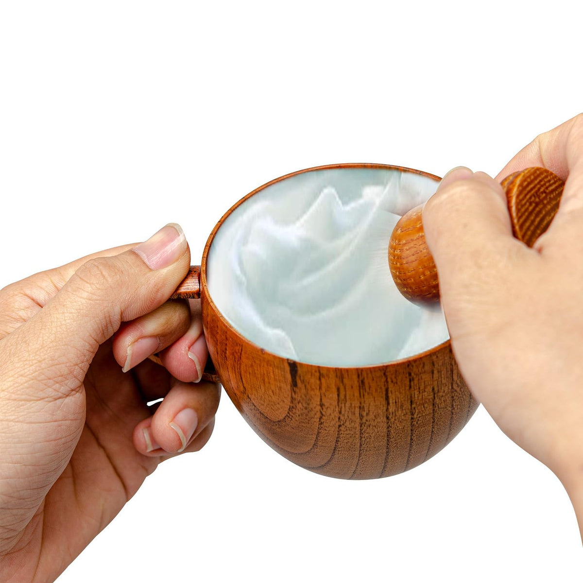 Grandslam shaving brush showing the solid wood handle with ergonomic grip.