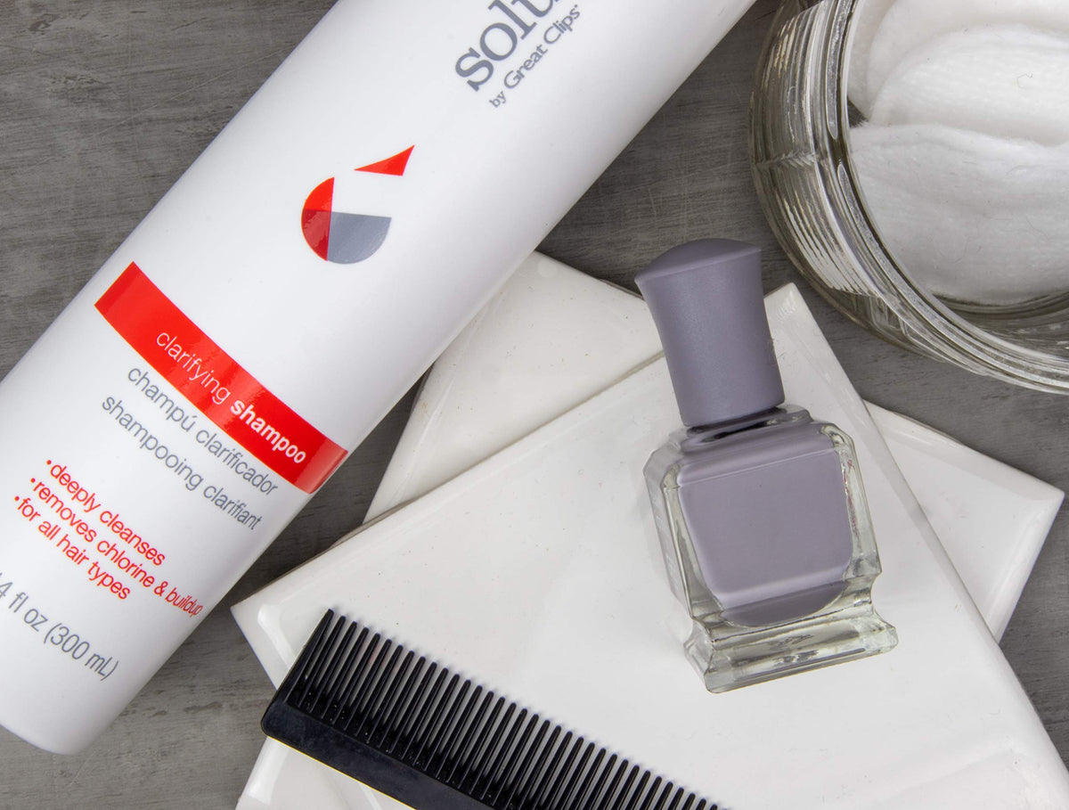 Great Clips Solutions Clarifying Shampoo bottle back with usage directions for swimmers.