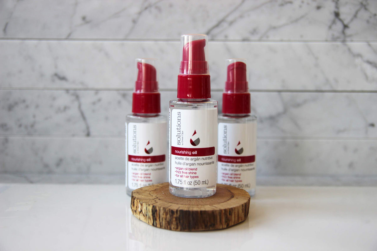 GREAT CLIPS Nourishing Oil texture close-up reveals lightweight non-greasy finish.