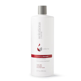 Great Clips Solutions Nourishing Shampoo bottle with argan oil for color-safe moisture.
