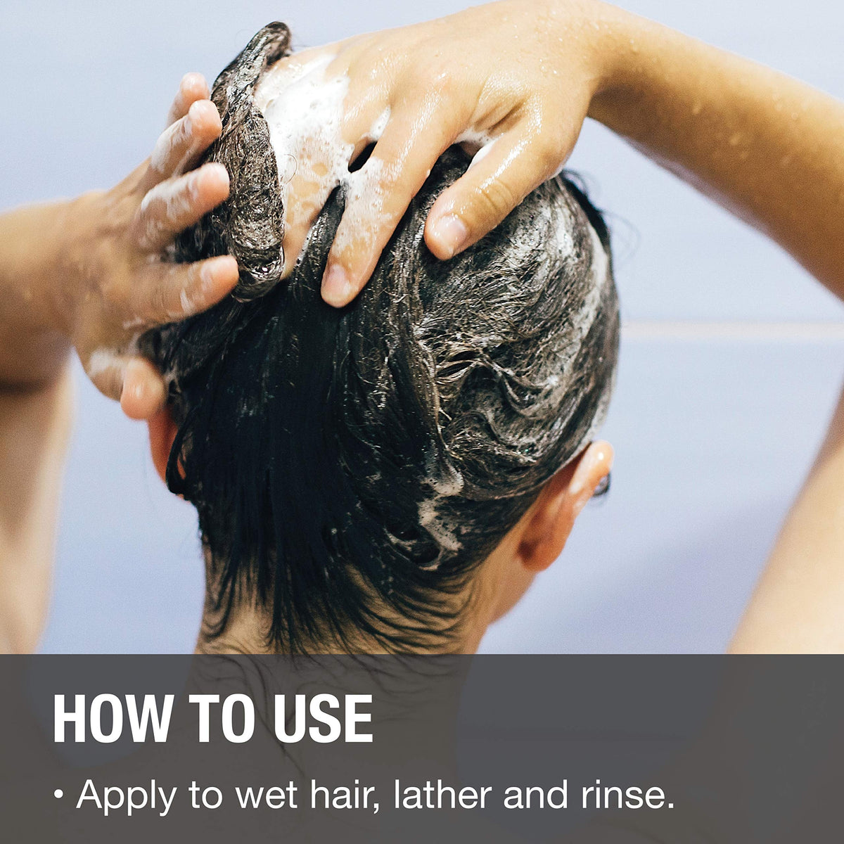 Great Clips Solutions Volumizing Shampoo foam closeup conveys airy texture